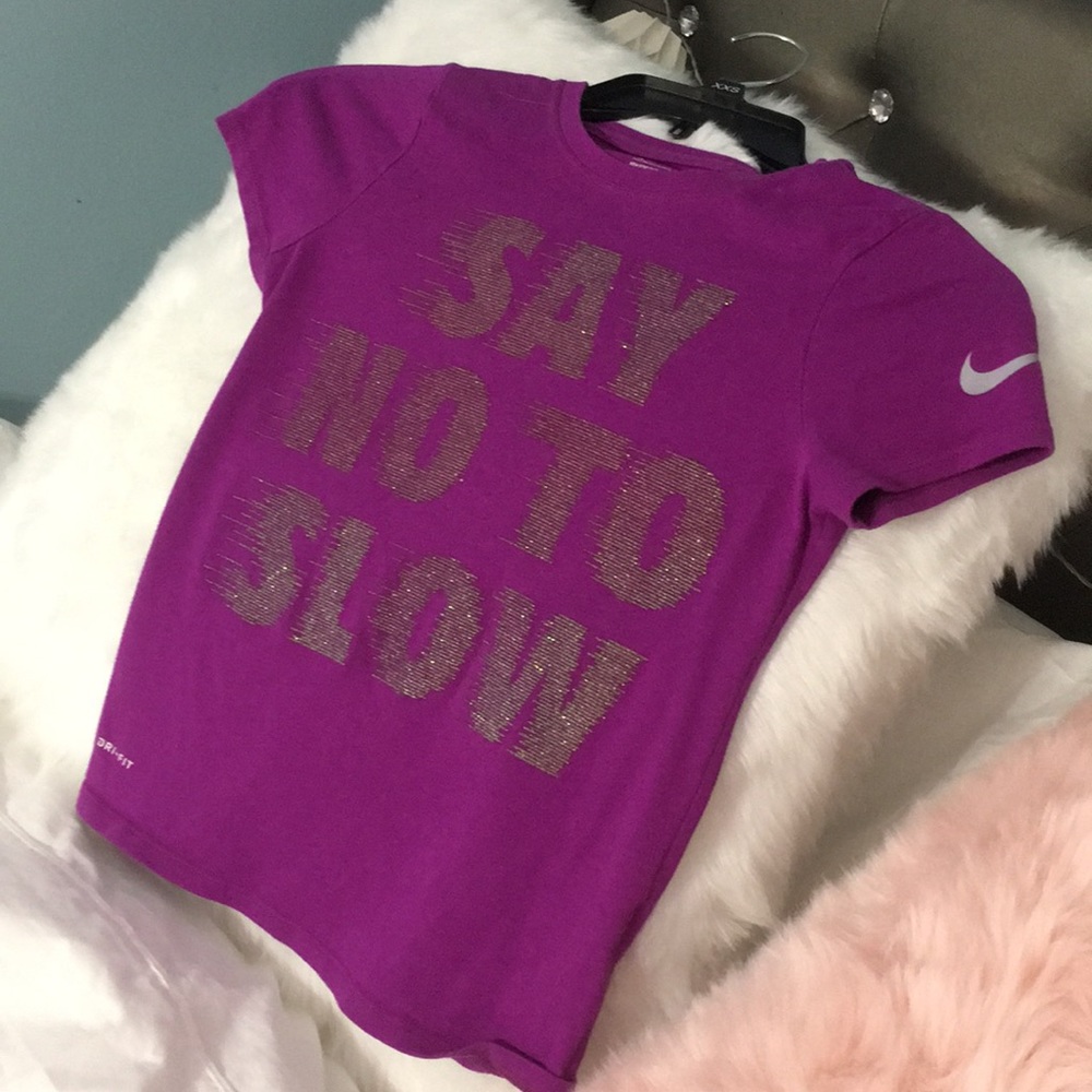 A purple Nike shirt ❗️